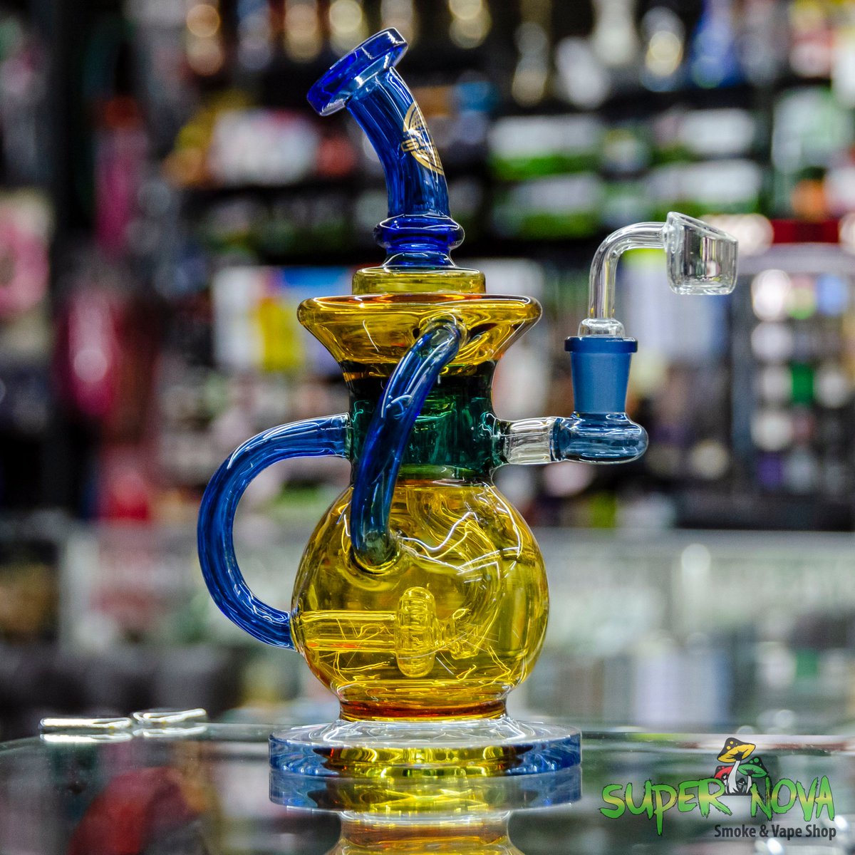 supernovasmokes's tweet photo. On Point Glass amber and blue recycler with 14mm 90° female joint. @onpointglass #onpointglass #onpoint #recycler #recyclerrig #quartzbanger #slanttopbanger #bangers #waterpipes #waterpipe #GlassWaterpipes #smokinggood #loadabowl #glassofig #glassforsale #smoking #14mm https://t.co/NnTFMSfBXm