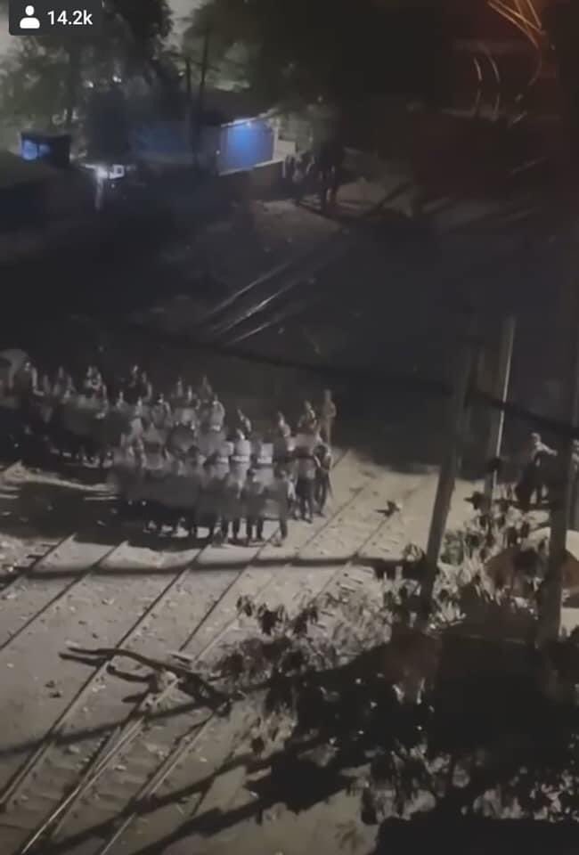#WhatishappeninginMyanmarRightNow                                                                Police and soldier raid to the district in Mandalay where railway staff families live and shoot to the houses to stop their CDM (Civil Disobedience Moment)