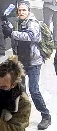 FBI's tweet image. A number of people involved in the violence at the U.S. Capitol on January 6 are still at large. Help the #FBI apprehend them. If you recognize this individual, submit a tip to tips.fbi.gov. When you leave a tip, reference photo 223.