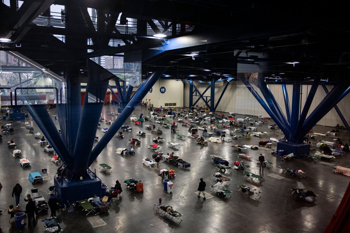 RedCross's tweet photo. Millions of Texas residents are still without electricity after a dangerous winter storm swept across the state. More than 700 people are staying at a shelter at the George R. Brown Convention Center in Houston, Texas, where Red Crossers are helping. https://t.co/jbtaq1uUWI