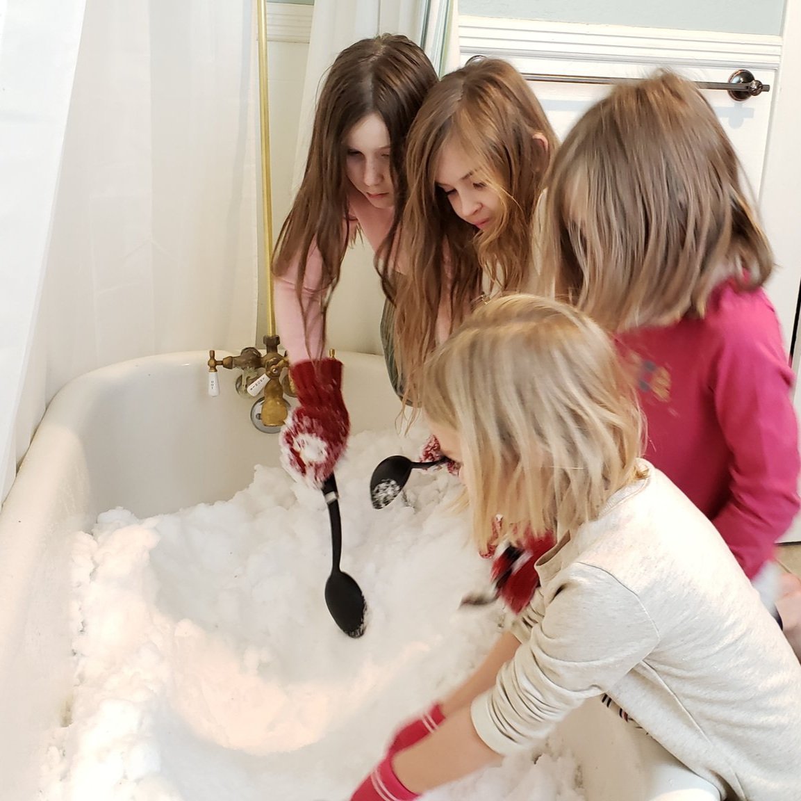 XplodingUnicorn's tweet photo. We finally found a way to let the kids play in the snow without spending an hour getting them bundled up for the cold. They're not even wearing socks. https://t.co/xYsmOavToC
