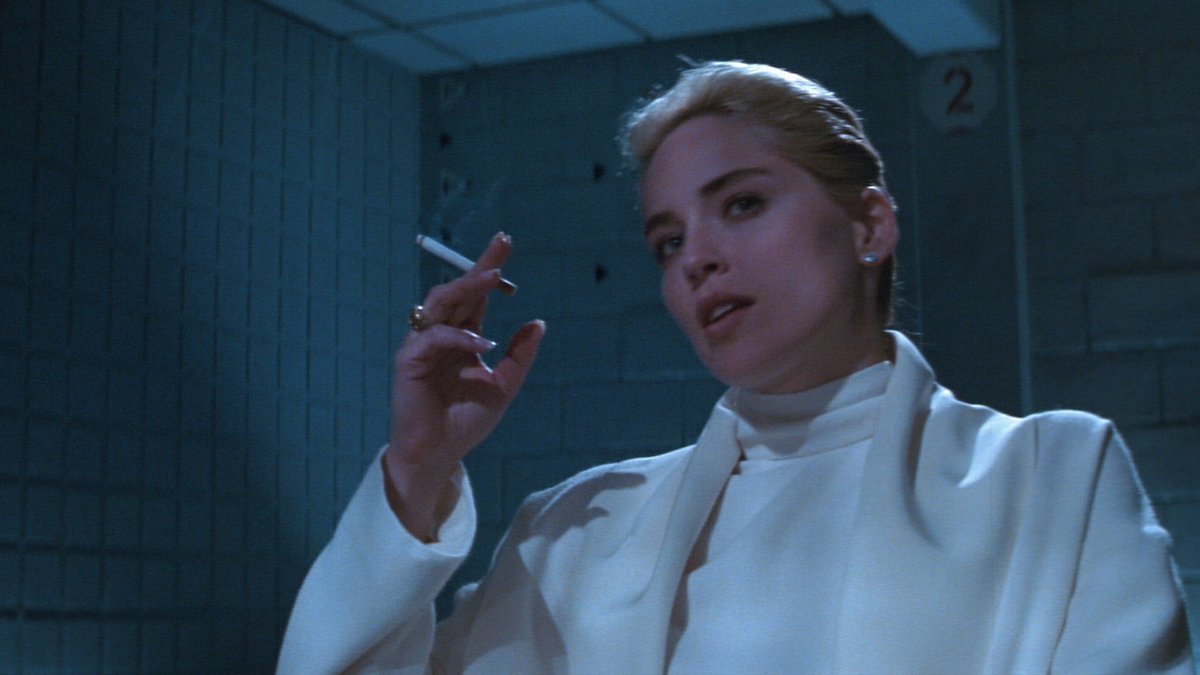 In the most infamous scene, Sharon Stone smokes a cigarette while wearing a turtleneck and a cloak—a favorite queer pastime.