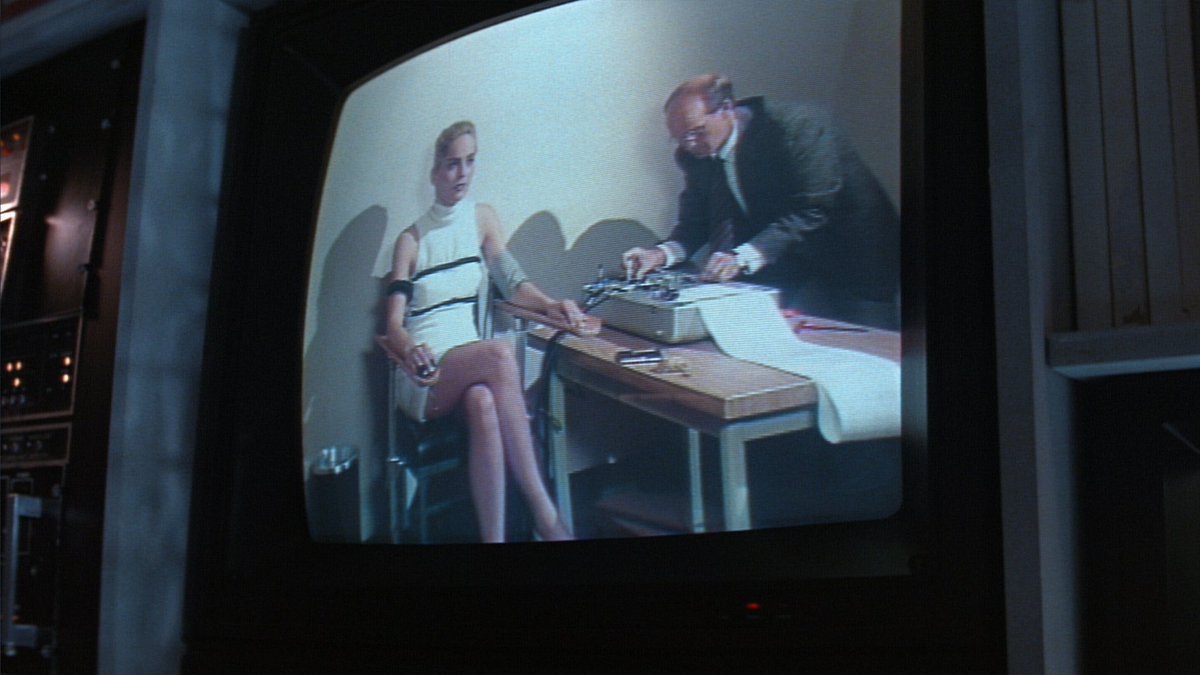 Sharon Stone takes a polygraph test, which, many people don’t know this, is actually VERY queer. Even though a polygraph is a machine, which is super hetero, it *does* involve lying, anticipation, and twisting knobs—all of which are inherently queer.