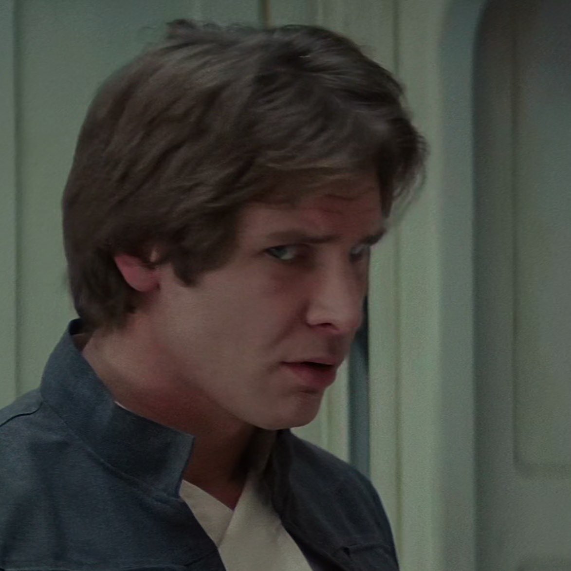 Looks at him in return.