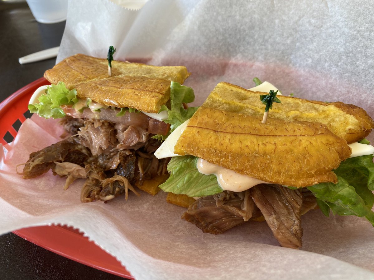 ComesAnnemarie's tweet photo. When your Puerto Rican Friend takes you out (belated Birthday) for an authentic Puerto Rican Plantain Sandwich, and some other goodies...... mmmmmm #flan #jibaritos #maduros https://t.co/oEMtBsv03a