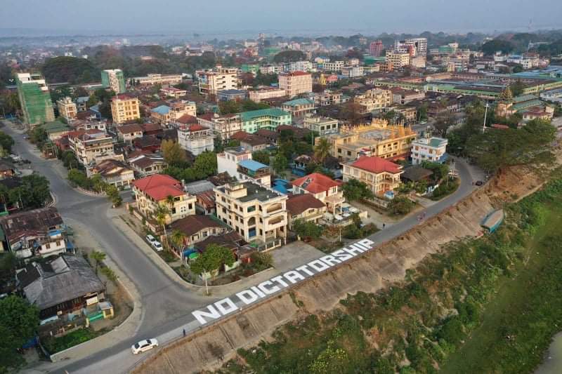 88rimmeram's tweet photo. @RapporteurUn Image from today “No Dictatorship” painted on a road in #Myanmar  Myitkyina, Kachin State, joining the nationwide opposition against the military regime on Thursday.
GIVE BACK HUMAN RIGHTS
#Feb18Coup 
#WhatsHappeningInMyanmar https://t.co/jzR1C38CG5