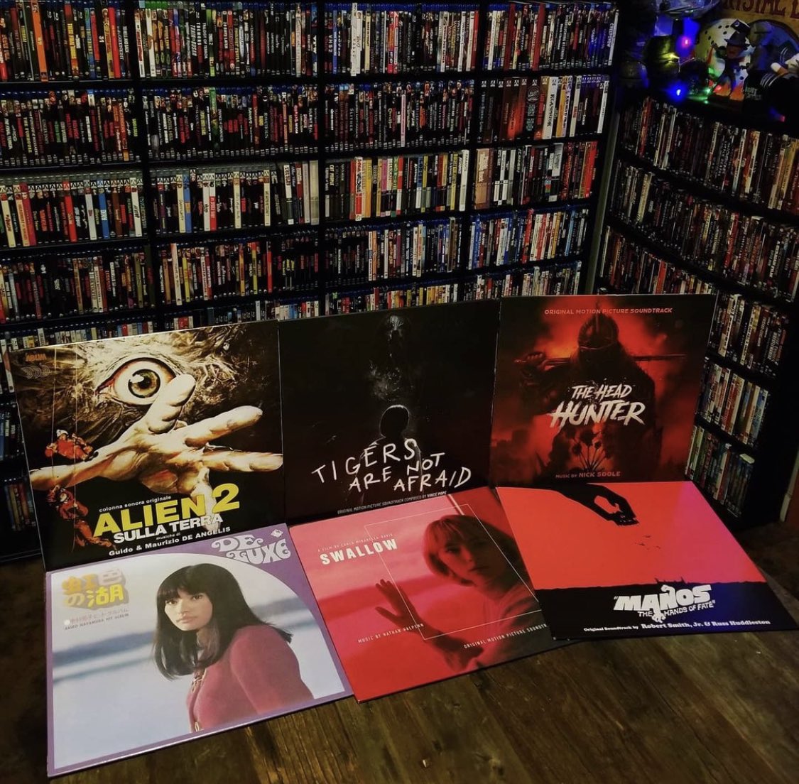 It’s no secret that our friend @mikeburnswho on IG has an incredible collection of #physicalmedia 🤤 pic features: Alien 2: On Earth, Tigers Are Not Afraid, The Head Hunter, Swallow, Manos: The Hands of Fate, annnnd Akiko Nakamura’s Hit Album LP shiptoshoremedia.com