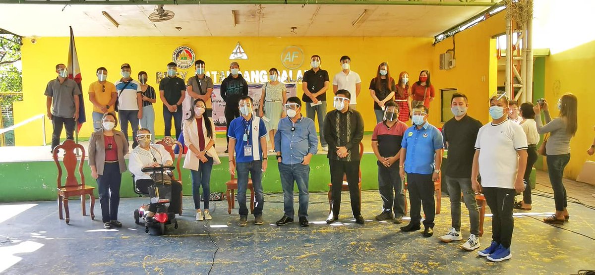 DOLE Sec Silvestre Bello III, OWWA Administrator Hans Leo J. Cacdac, together with OWWA officials, award Project EASE Scholarship Grant during the OWWA Regional Launching of Programs and Services at Matandang Balara, Quezon City.