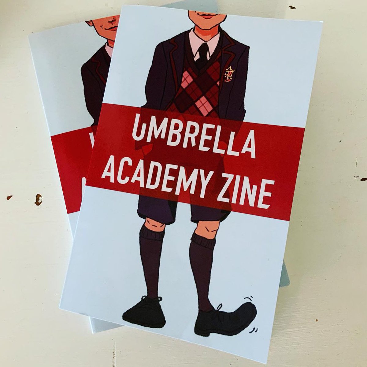 tuafanzine's tweet photo. The final sample has arrived! Here’s a sneak peek at our zine. Super proud of all our talented contributors. We’re getting ready for bulk production now ☂️🎉 https://t.co/so7UHHJXGY