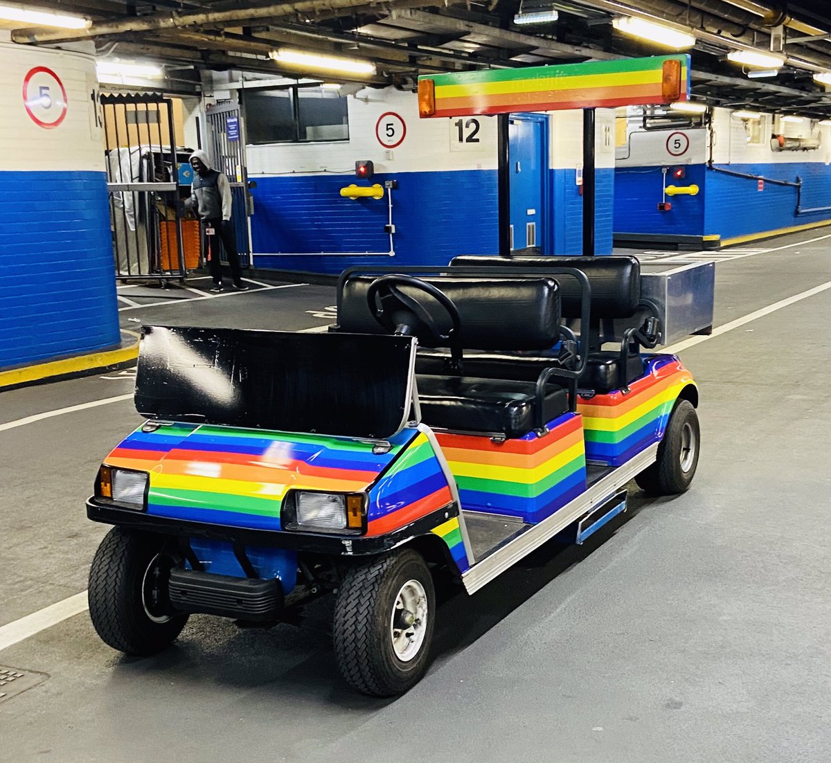 [2/8] This 'buggy-bow' is adorned with your basic Rainbow Pride Flag, comprised of six colours. Designed by American artist and gay rights activist Gilbert Baker. Buggy-bow and image from  @NetworkRailEUS