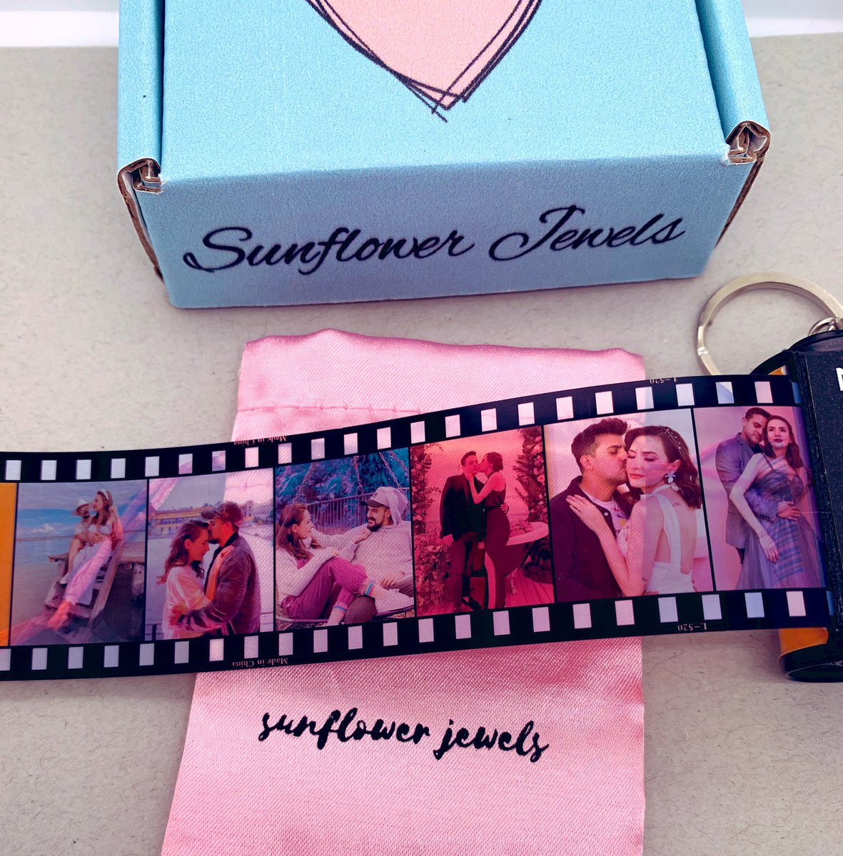 rakilstormi's tweet photo. He got me the cutest film roll keychain with pictures of us in it for Valentine's 🥺🤍 https://t.co/NsOCsg4yGT