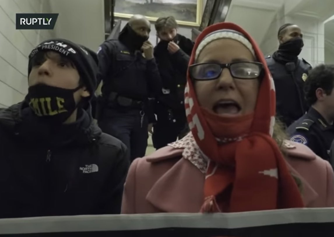 This mother brought her 14 year old son, he’s the one in the “smile” mask. Approx. 40:37 in video  #SeditionHunters  #DCRIOTS  #CapitolRiots  #Doyouknowme 