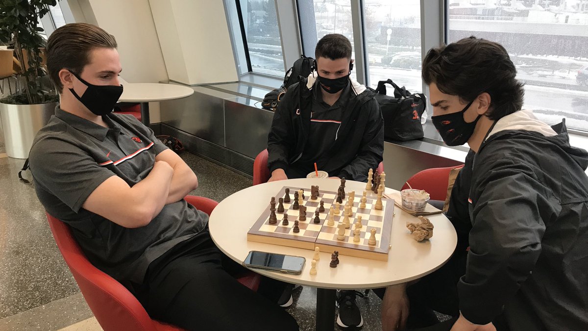 BeaverBaseball's tweet photo. Locked in on some pre-flight chess. #GoBeavs https://t.co/OuYkNHWT59