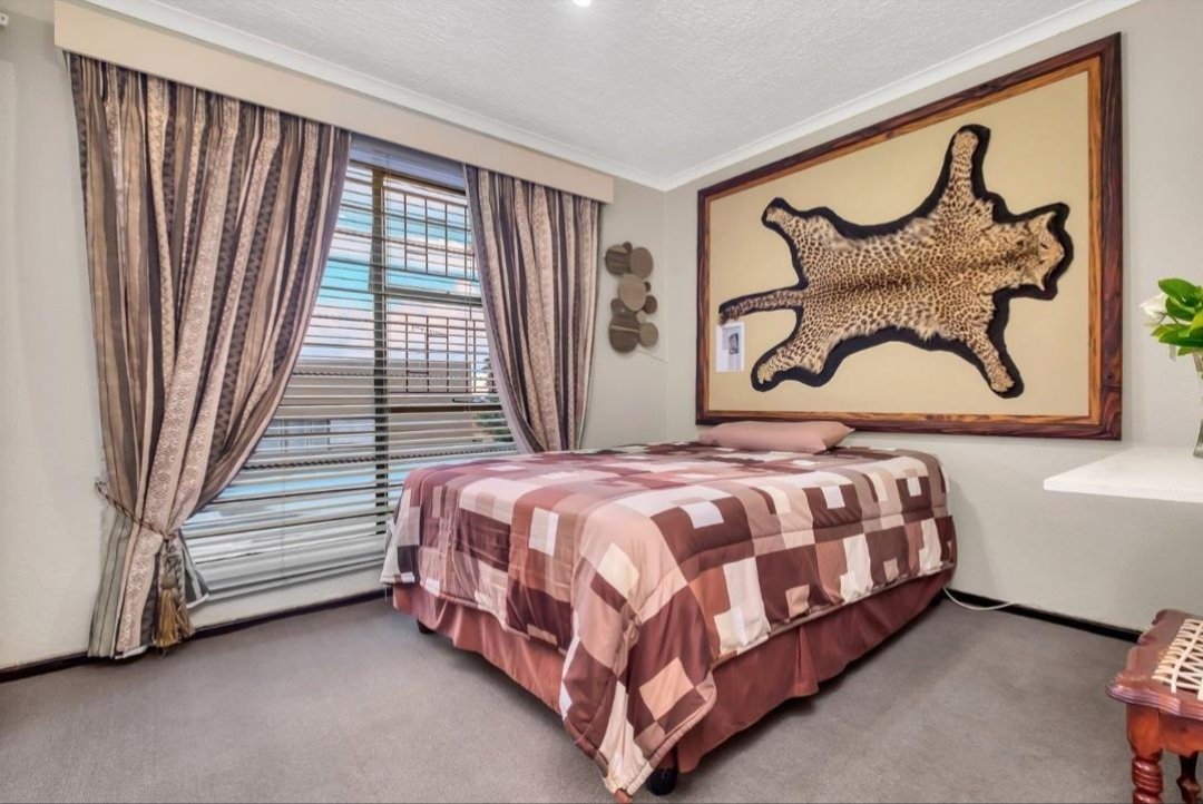 I think my favourite part of all of this is the half-empty Coke bottle next to a bed someone was clearly just lying in. Also, the tapestry.