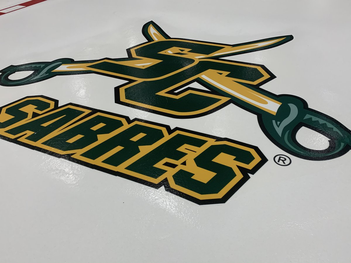 IcecoAdvanced's tweet photo. Yesterday @IcecoAdvanced completed install at @GatewayIce, a mix of hand-painted and textile logos - @Marz_Homes - @RLPState - @GrandRiverStone - and a special coin installed on ice for @SCJuniorSabres - have a great season! https://t.co/lg0jdzKmI8