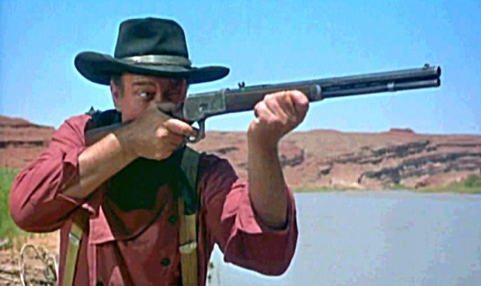 Like the Colt SAA, the Winchester 92 had stayed in production from the year it came out (1892) until WWII. Despite the fact that most Westerns are set before 1892, Hollywood bought it in bulk due to its availability, ease with 5-in-1 blanks & resemblance to older Winchesters