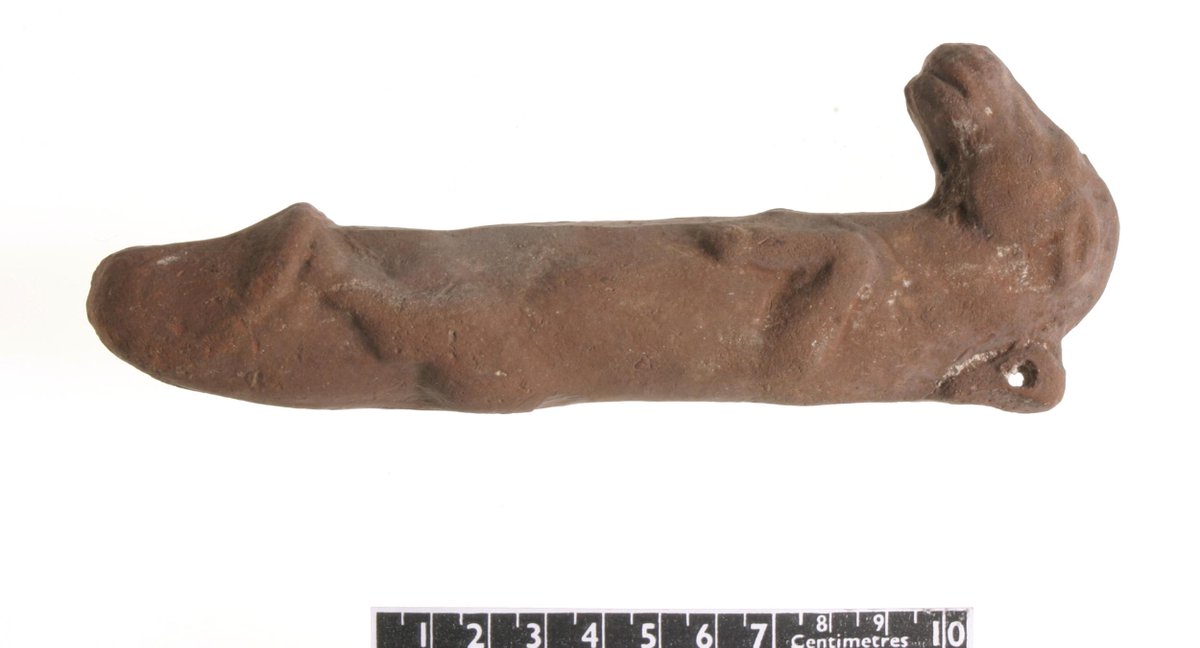 look, BM, i'm just gonna go out on a limb and say this 7 inch long glazed terracotta 'charm' was... probably not worn about somebody's neck. a/n 1982,0406.10