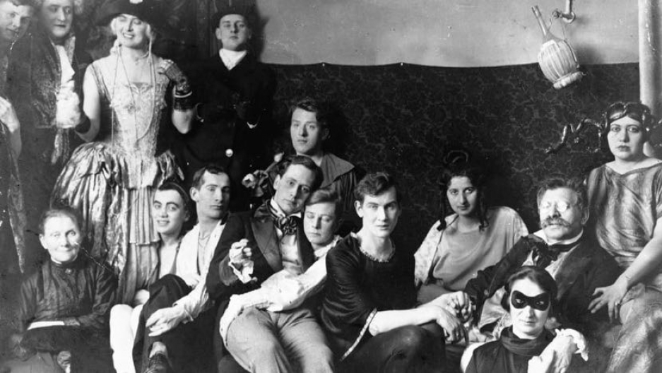 something beautiful: a photo from a party at the institute. magnus hirschfeld (second from right) is the one with the moustache and glasses. his partner karl giese is holding his hand. (late 1920s)