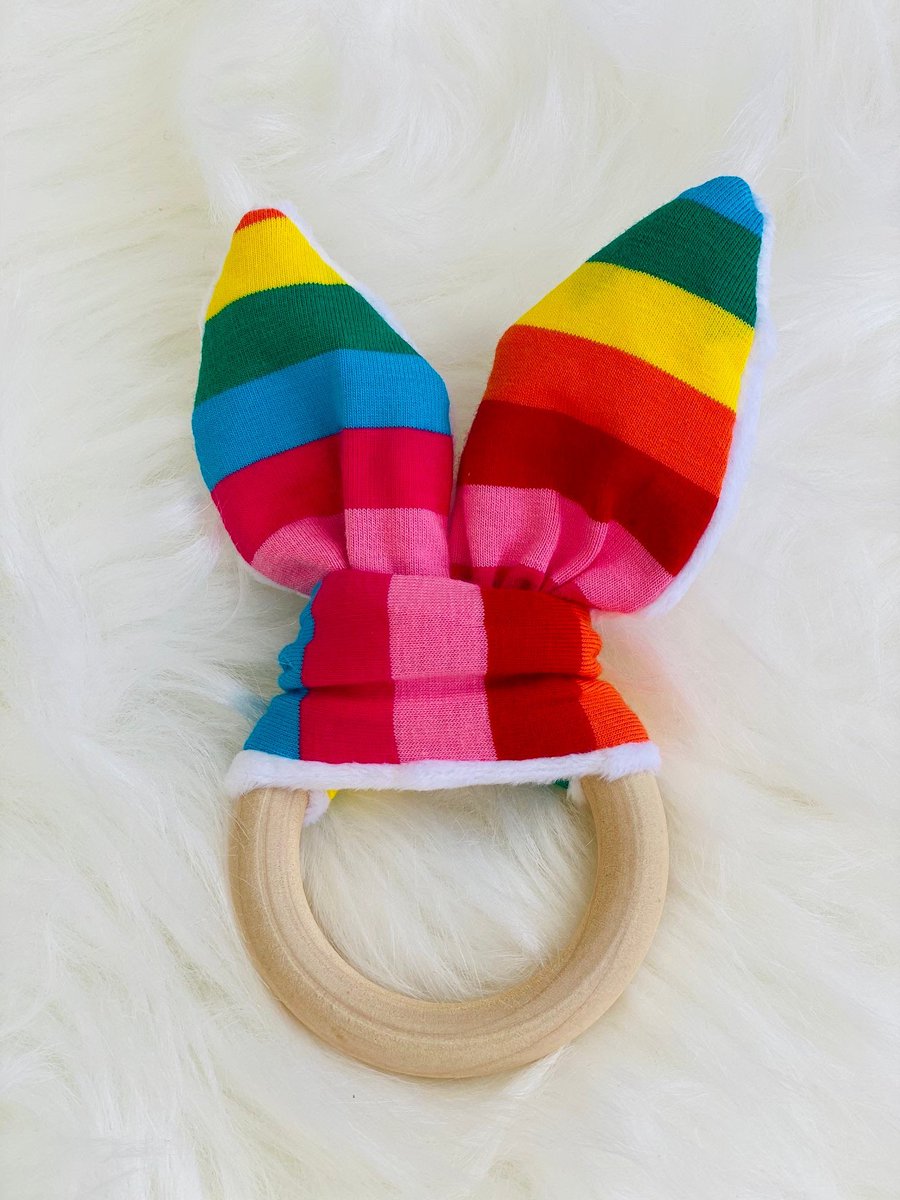 DenLearning's tweet image. Excited to share this item from my #etsy shop: Rainbow bunny ear wooden teething ring #sensory #send #bunnyearteether #bunnyear #earlyyears #rainbowsensory #sensorybox #sensoryplay #teether etsy.me/3ubzwyV