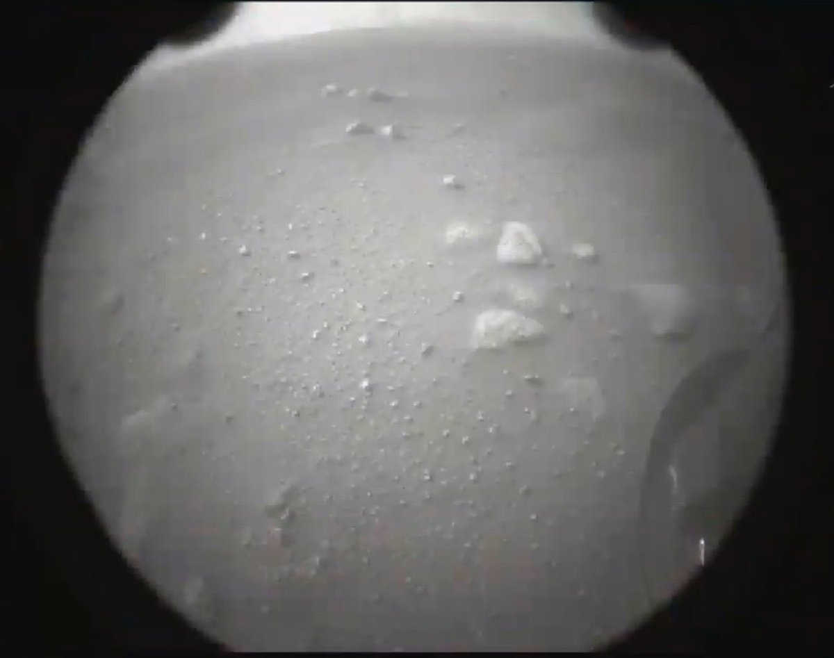 LesterHoltNBC's tweet photo. First photos from NASA’s Perseverance just after it’s touchdown on Mars. @tomcostellonbc will tell us how it will search for ancient signs of life tonight on @NBCNightlyNews https://t.co/JmtcAfhLYw