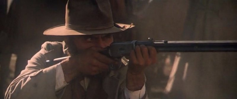 The practice continued well into the 80s and you can spot a couple Winchester 92s masquerading as Henry rifles in The Long Riders & Heaven's Gate (even though the Johnson County War was happening around the time the Winchester 92 was released)