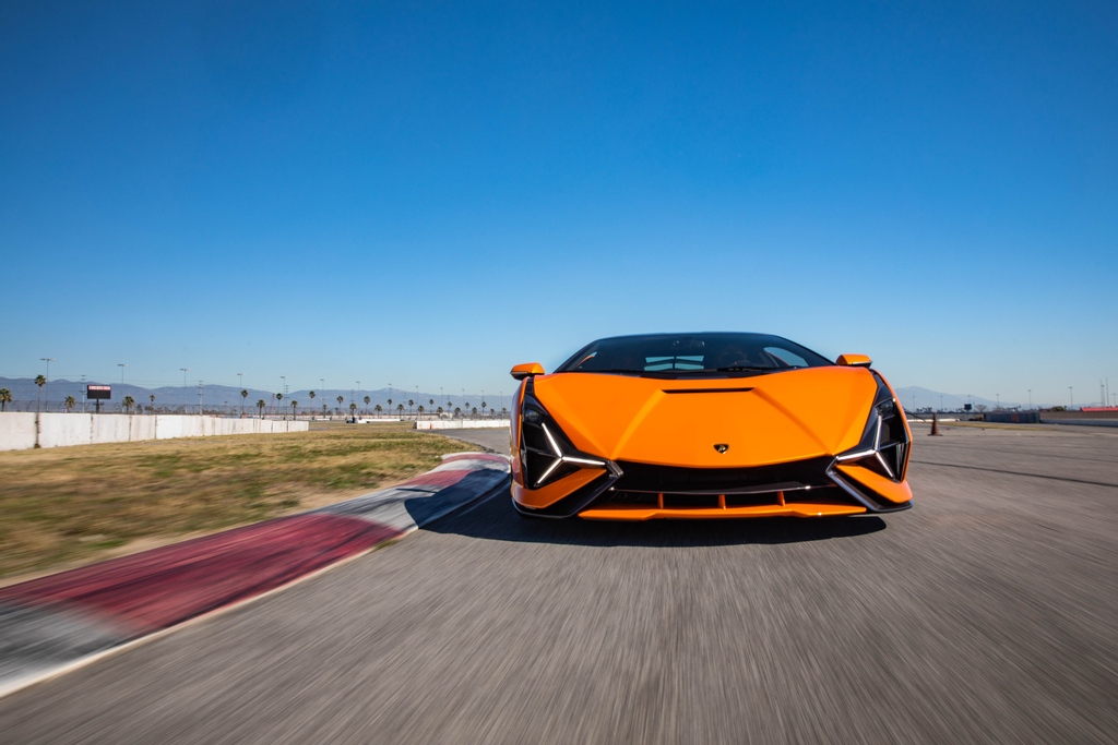 Lamborghini_NB's tweet photo. Our stunning Arancio Atlas Lamborghini Sian recently hit the iconic Auto Club Speedway!🏁

Who would you take as your passenger for a lap in this Sian? Tag them in the comments!

#Lamborghini #LamborghiniNB #LamborghiniNewportBeach #NewportBeach #Sian #LamborghiniSian #SianFKP37 https://t.co/633idNQNpv