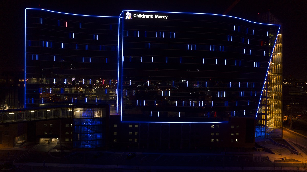 ChildrensMercy's tweet photo. The @ResearchCM is officially open! At first glance, the building may seem to be lit with a random assortment of lights. It's actually a design based on our patients' DNA. The #DNA sequences represent the groundbreaking work happening inside the building to find answers for kids. https://t.co/HUdRtKEhax