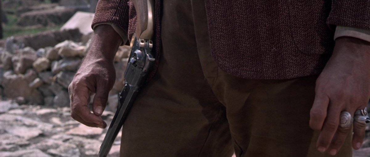 Because cap-n-ball revolvers are a pain to load, they switch to cartridge conversions whenever they're fired. You can tell because the cylinder nipples disappear & are replaced with loading gates. Cartridge pistols were a post-War innovation but the change is understandable...