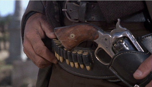 Though I don't know how Angel Eyes got that cartridge belt or how he's going to load those cartridges into that cap-n-ball cylinder. Anyway, I'm getting off track from gun modifications...