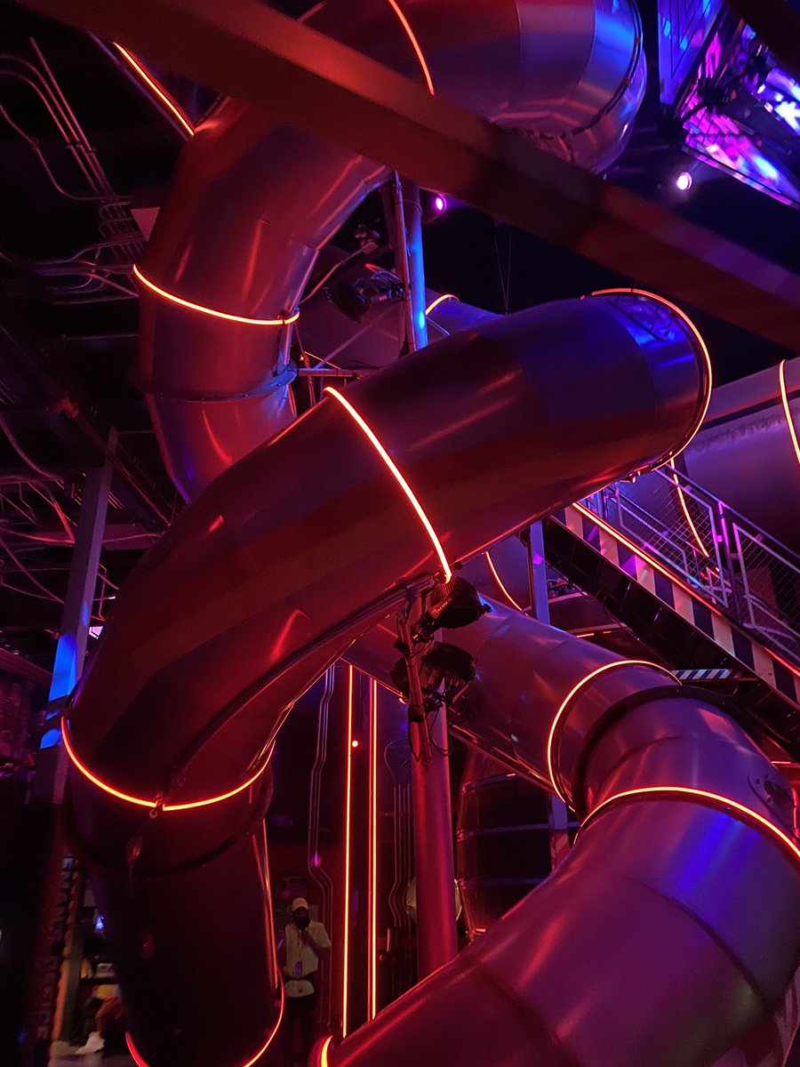 Next we have the heart of Omega Mart: the factory with slides (that, YES, you can ride!!) as the arteries. The area is filled to the brim with steep spiral staircases and interactive games and activities.