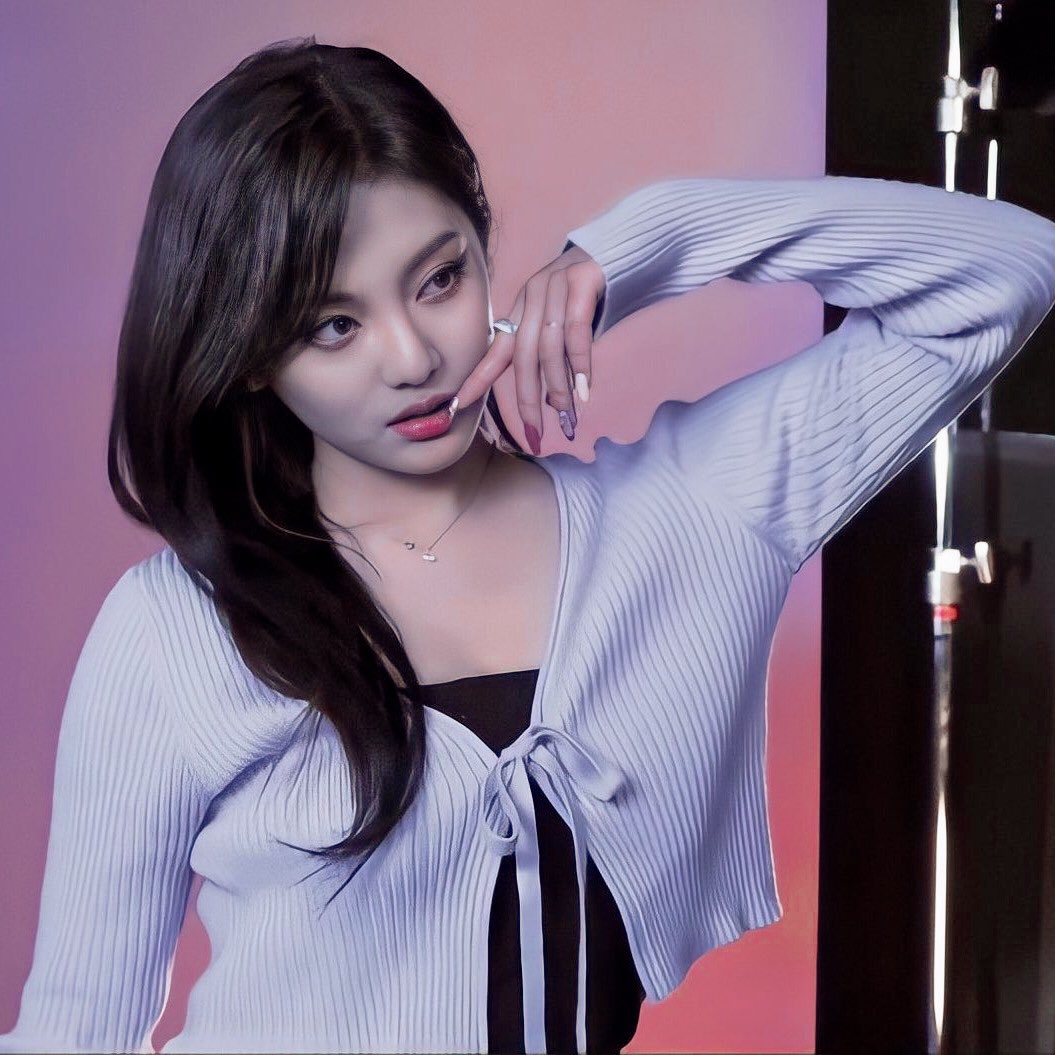 She resembled a flower in a greenhouse: emitting a delicate atmosphere.