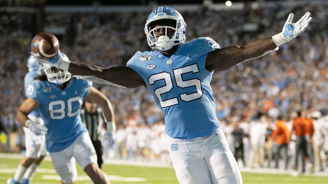 • Javonte Williams •Age - 20Height - 5’10”Weight - 220lbs2020 Stats:Rush - 157/1140/19 - 7.26ypcRec - 25/305/3 - 12.2ypr• PFF rushing grade: 95.9 (1st)• Avoided tackles: 75 (1st)Career Stats:Rush - 366/2297/29 - 6.28ypcRec - 50/539/4 - 10.78ypr