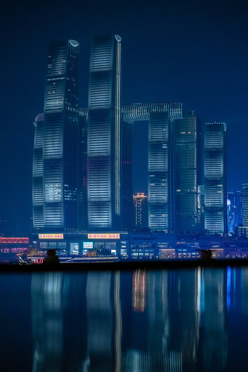 Raffles City during nighttime! 
Showing off two beautiful colours 🌟

#rafflescity #Chongqing