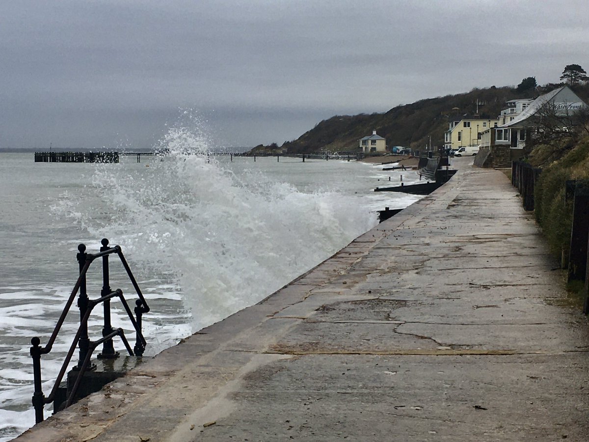 Totland Bay this afternoon. A bit of a swell coming in, and a glimpse of sun through the clouds! #totlandbay #isleofwight
