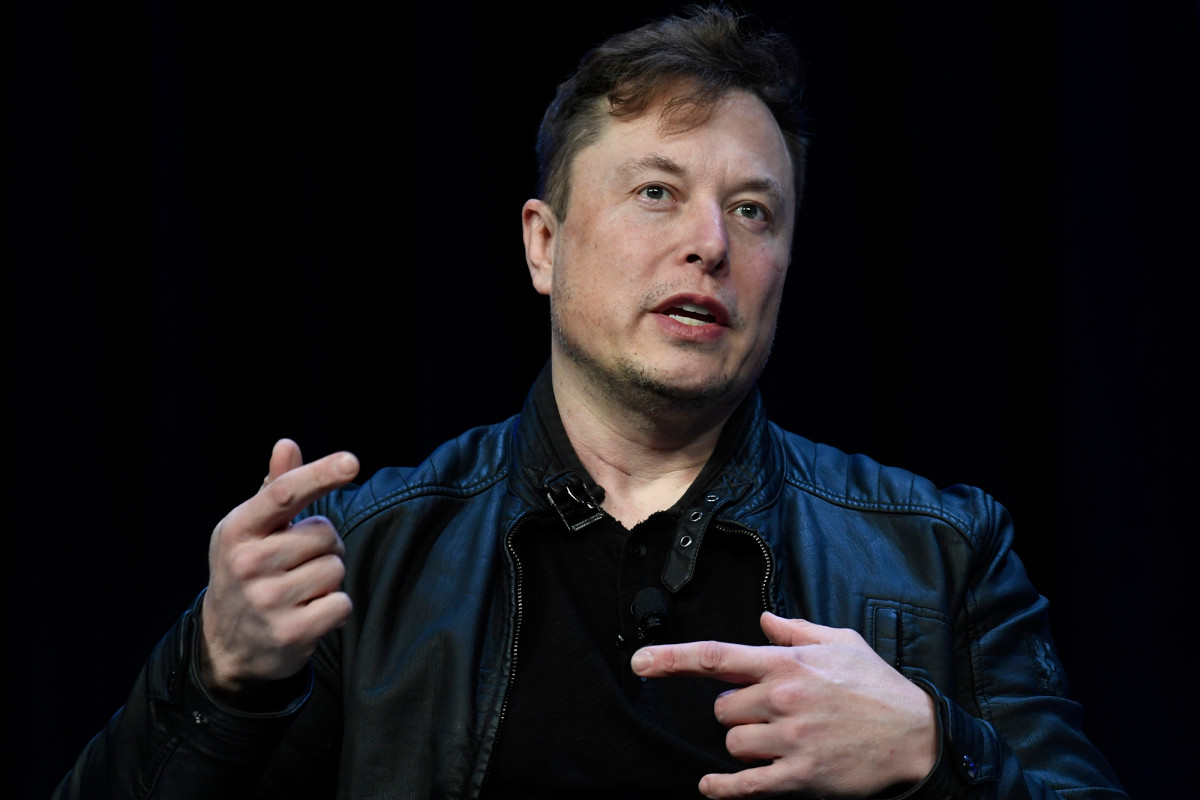 Elon Musk calls bitcoin 'less dumb' than holding cash