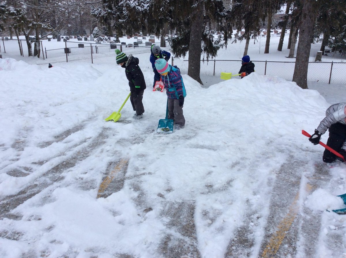 Our kindergarten students enjoying the new snow shovels purchased by our amazing School Council!  (I guess we'll cancel our snow removing contractor now! 😉)