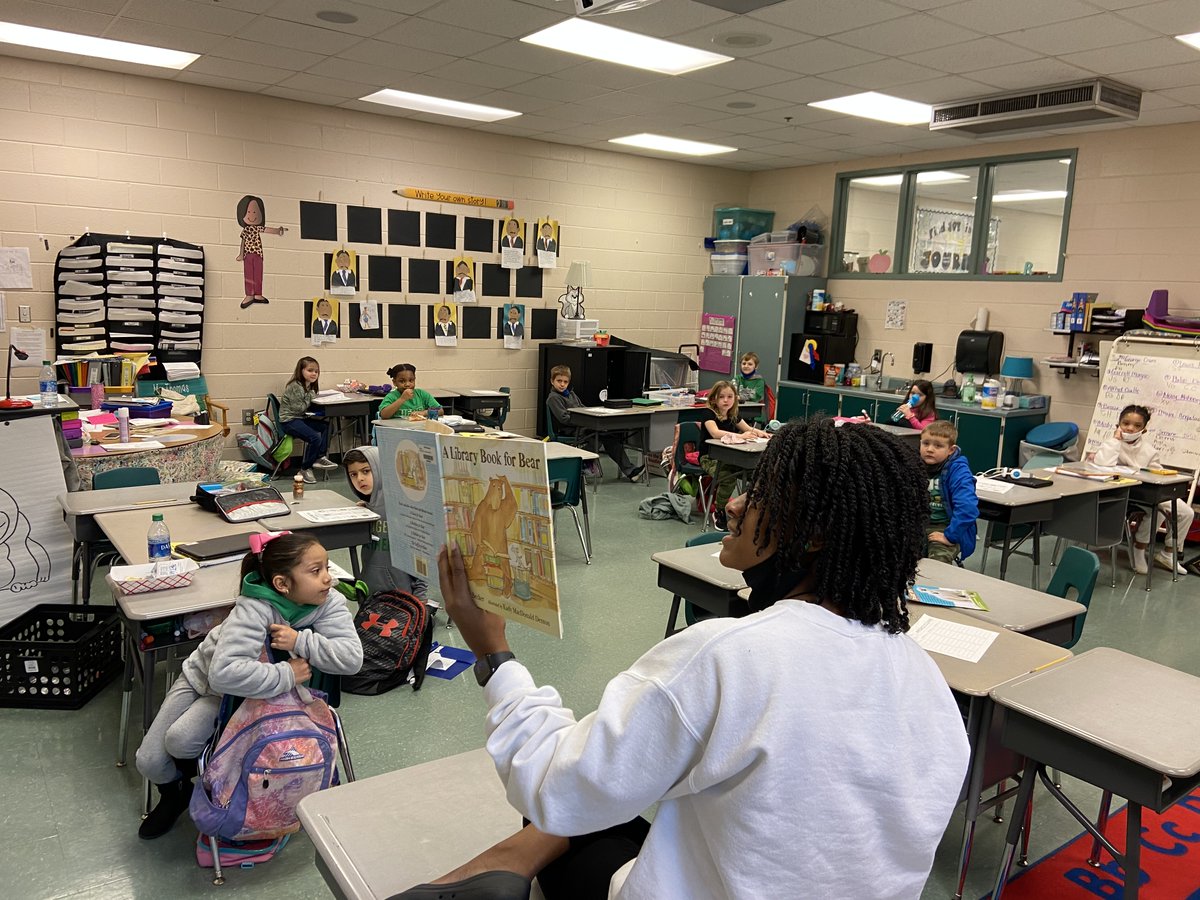 Mrs. Thomas was reading her book for the day in the Round Robin.  Gearing up for our week of Read Across America in March.  Students are using their ratings sheet for each book to have handy when we begin to vote on our favorite books in March.