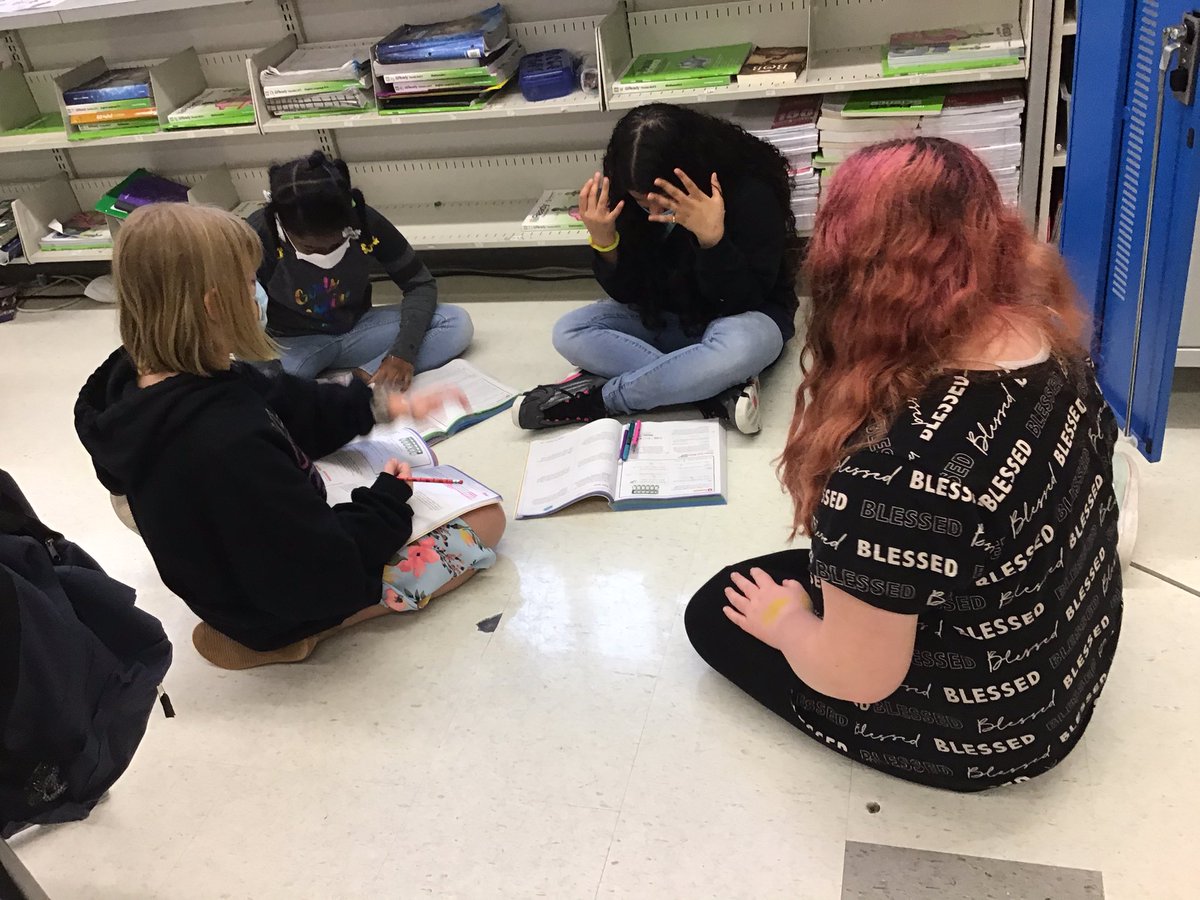 These third and fifth grades class work hard is small groups and on classwork!