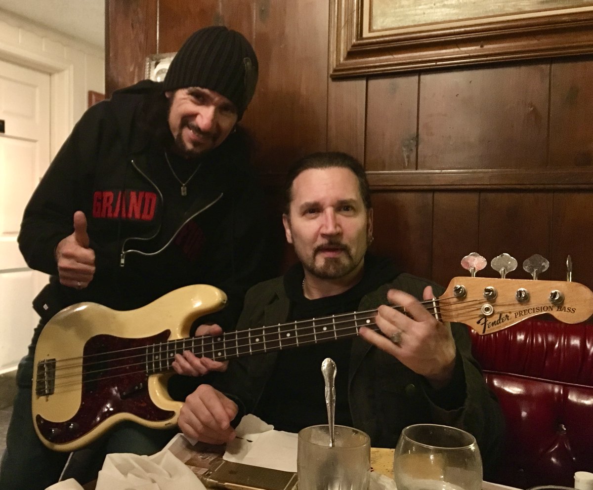 brucekulick's tweet photo. FBF to Dec 2015, with my friend Eric Singer at the "Hollywood Gun Club" event. Musicians and gear fans get together and show off their guitars. Eric is grabbing my 1968 P Bass in Olympic White. I am wearing my awesome GFR hoodie. You know I do miss these hangs with friends! https://t.co/ti9zNE24Q0