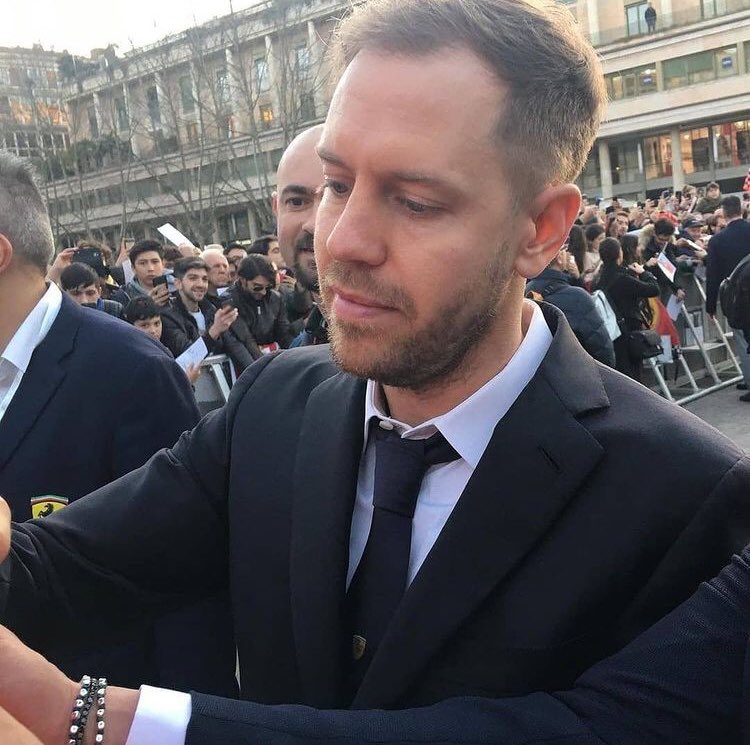 tennesseekidd's tweet photo. sebastian vettel in a suit. that’s it. that’s the tweet. https://t.co/ZDV1hFYHHF