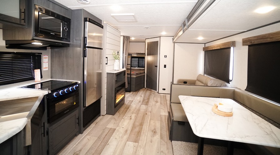 I CAN'T STAND THAT!! Little tiny trailers with no room...right?

Plenty of room here - you CAN stand in an Aspen Trail, no problem. 

Our Dutchmen Aspen Trail models boast an 82" ceiling height &amp; even still 6 ft in the slides! 
They're like basketball player "approved"! 
😂😆😂😆