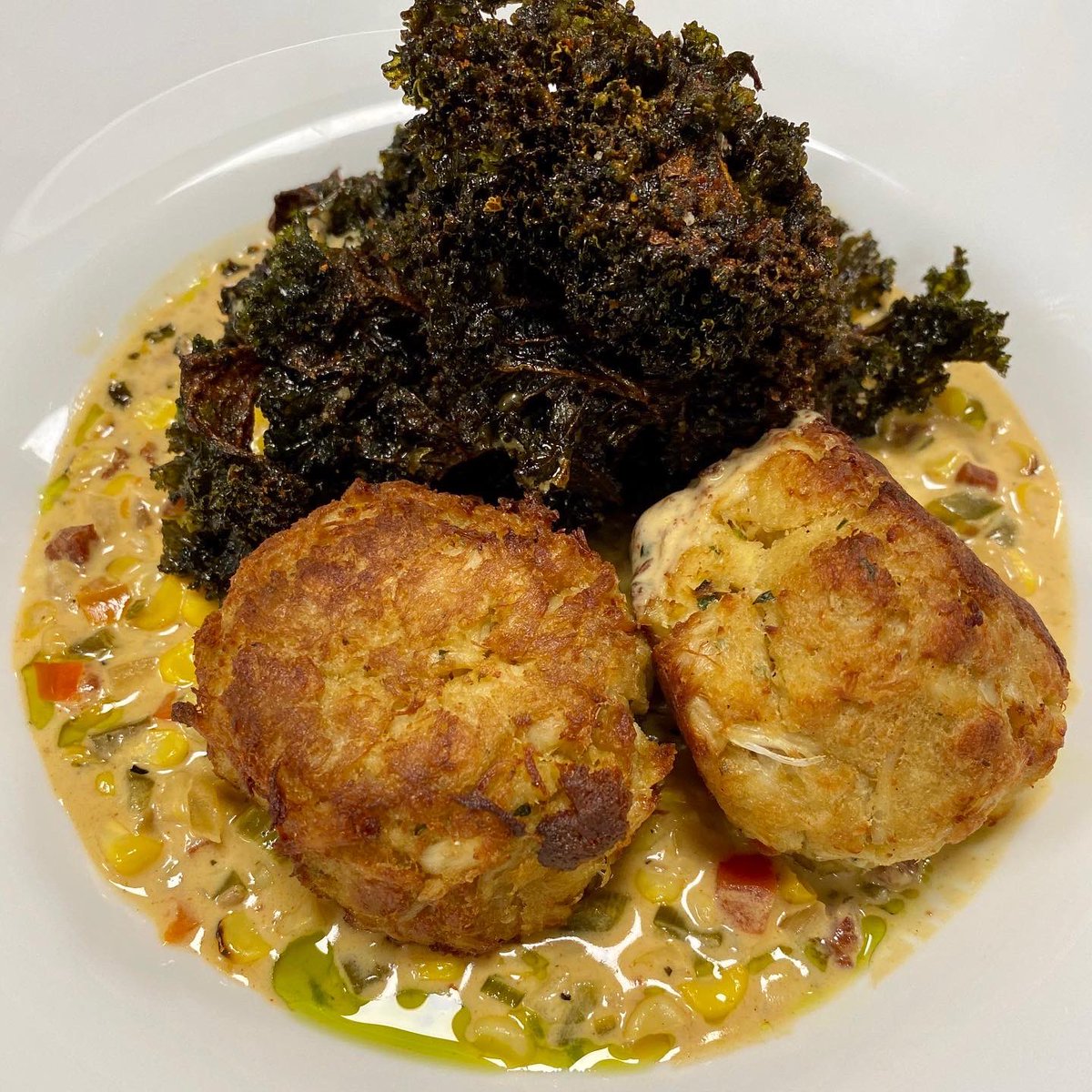 Join us for wonderful seafood selections this weekend featuring:
Redfish on the Half-Shell~Gulf Redfish filet, eaten out of the “shell,” blackening spice, creamy C &amp; D Mills rice grits. Plus two Baltimore style lump crabcakes &amp; crispy kale. Dishes served w/cajun corn Maque Choux