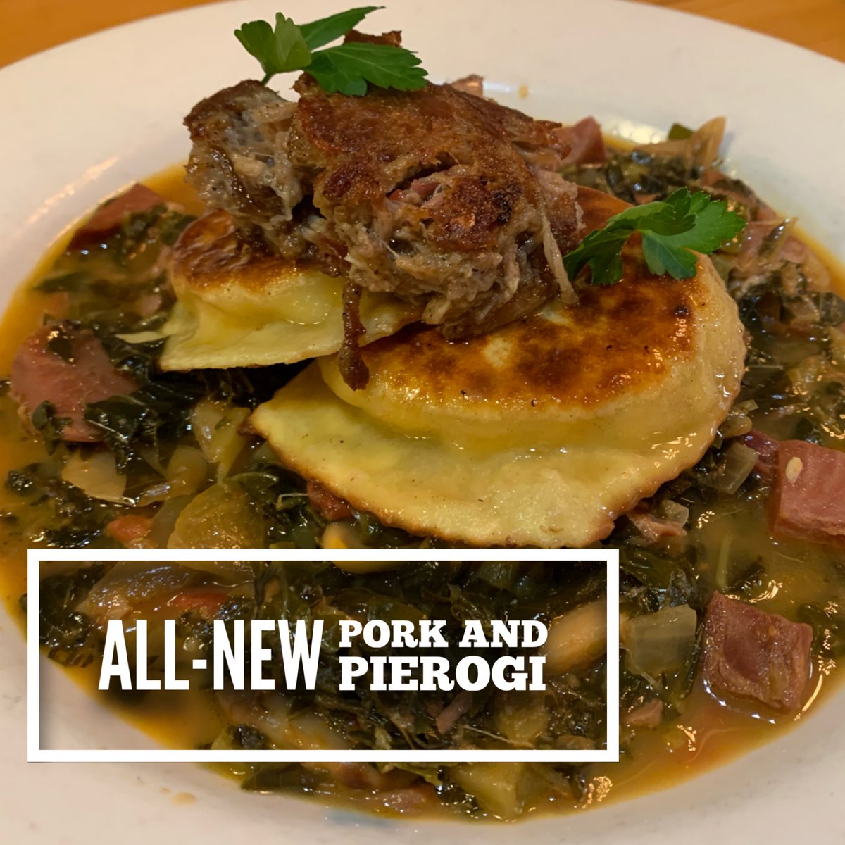 The all new pork &amp; pierogi with hardwood-smoked, crispy pork, house-made potato &amp; cheddar pierogi fried in butter of our braised collards and butter beans.  #pierogi #pulledpork #betterthanbbq