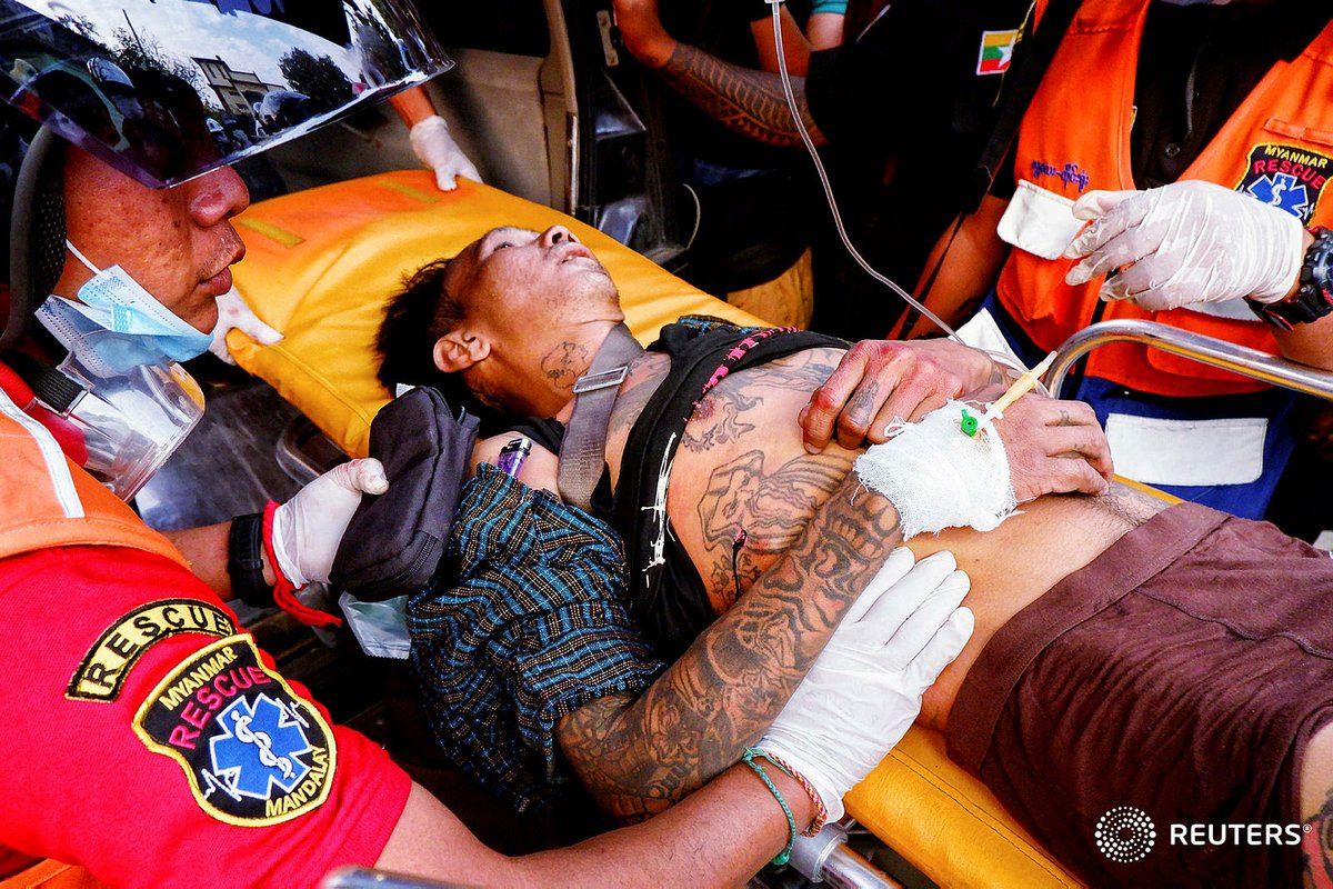 TostevinM's tweet photo. A wounded man after shooting by Myanmar forces at protest in Mandalay. At least two people were killed. #WhatsHappeningInMyanmar https://t.co/nDfnbxXmQn