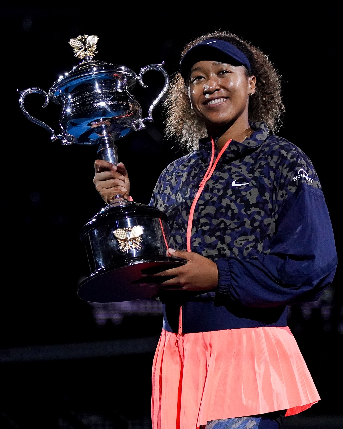 Naomi Osaka poses after claiming her second #AusOpen championship.
