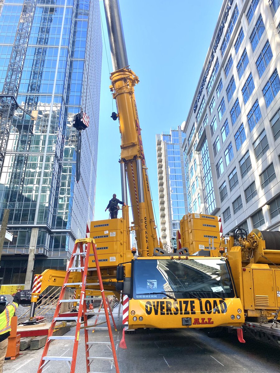 CortezRStafford's tweet photo. Two very large 600 ton and 900 ton mobile cranes have been erected on W. Peachtree St in Midtown Atlanta.  They will be used to safely dismantle the tower crane that suddenly started leaning yesterday at a construction site. #Liebherr https://t.co/tu7ruBIruI