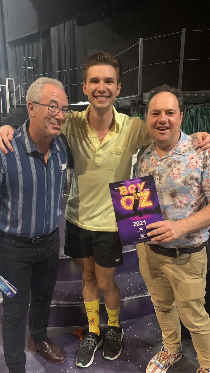 David_Spicer's tweet photo. Lucky to be allowed into Perth to see a stunning production of The Boy From Oz. Pictured here with Ethan Jones and We Will Rock You writer Ben Elton. https://t.co/X3dlkV9CXK
