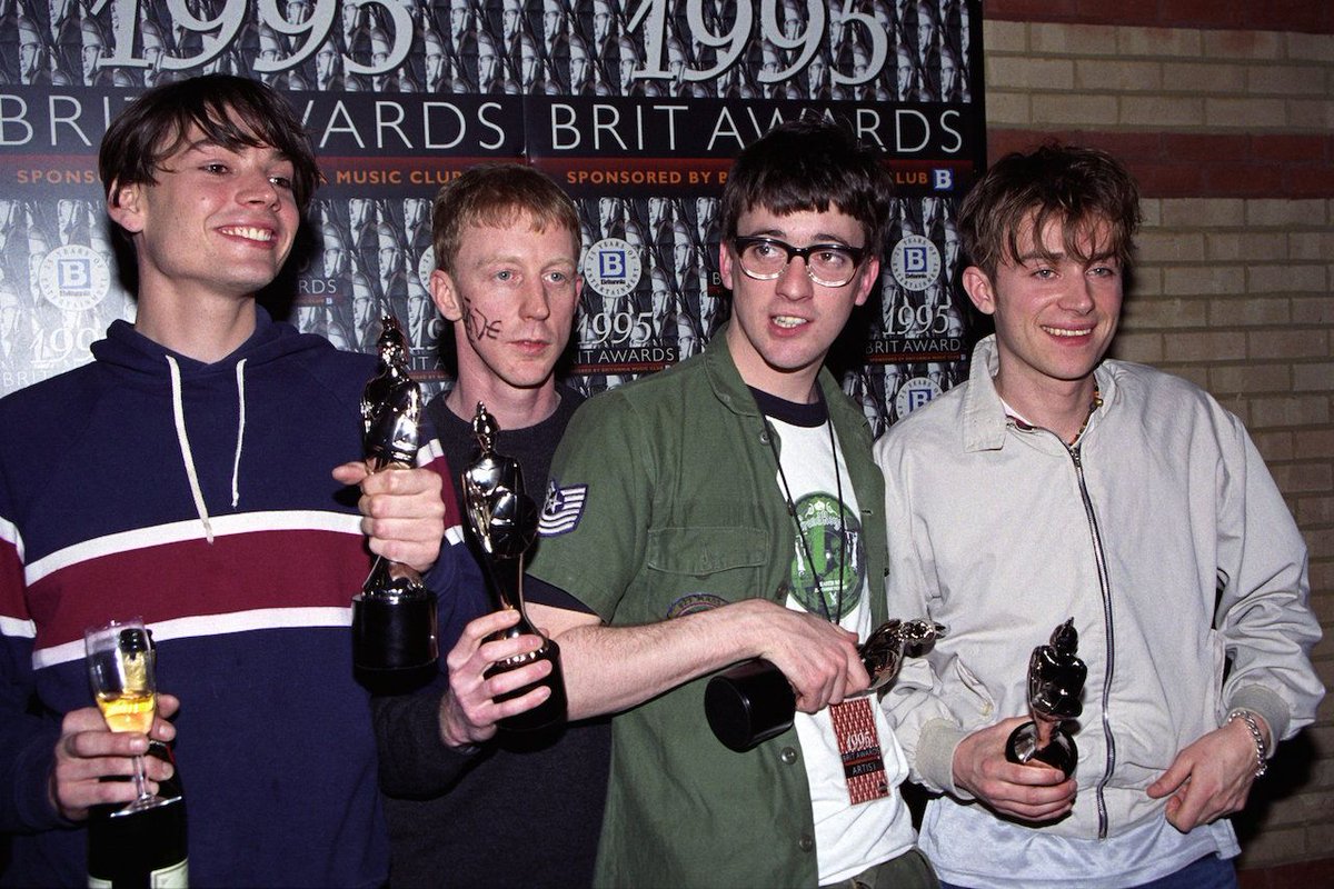 This was us, 26 years ago today, having just won 4 <a href="/BRITAwards/">BRITs</a>. Prince had fallen out with his record label and had written 'Slave' on his cheek. So <a href="/grahamcoxon/">graham coxon</a> wrote 'Dave' on mine. In case you're wondering.
<a href="/blurofficial/">blur</a>
