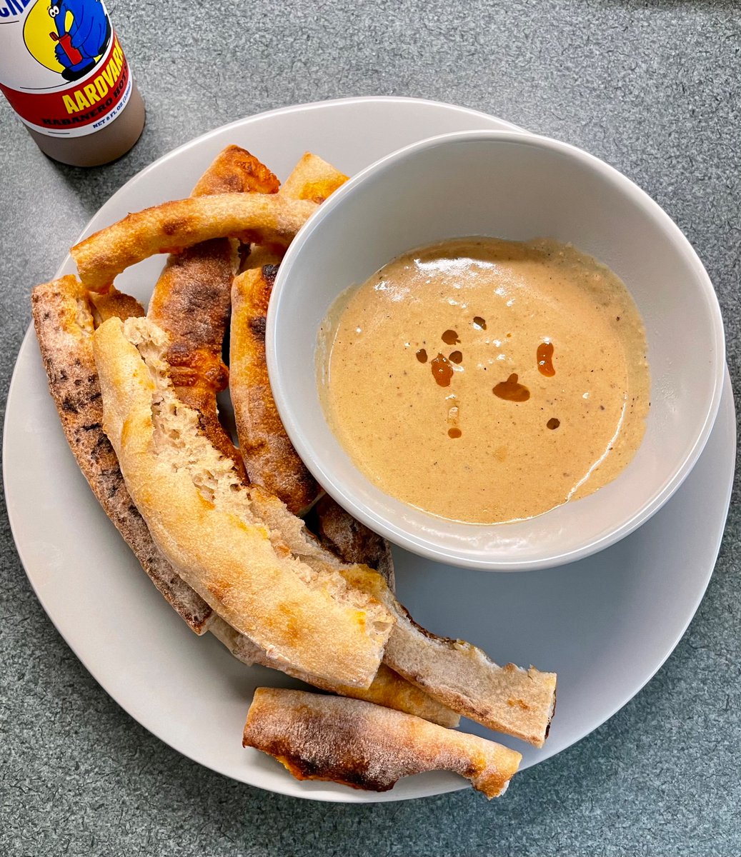 Today’s never-throw-out-food lunch: the kids’ pizza crusts, gravy made quickly in a pan I fried a steak in the other day. (I had pickles on the side for uh balance)