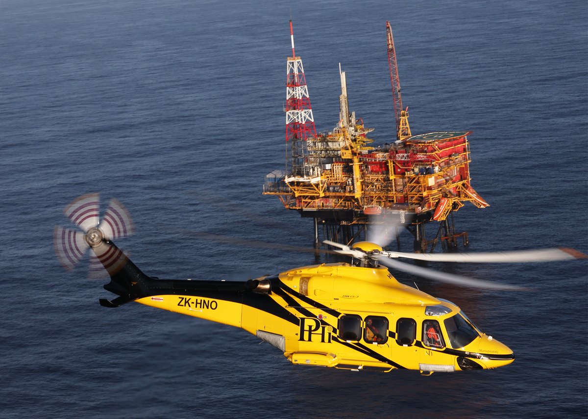 HeliOpsMagazine's tweet photo. Great shot by @kiwinednz of one of PHI's AW139s in front of the Maui platform off the coast of New Plymouth, NZ. #aw139 #phiaviation #helicopter #rotorheads #heliporn #oilngas https://t.co/VbNxOmgJz8
